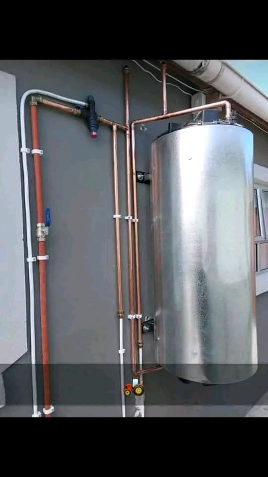 Plumbing pipes with silver tank installation